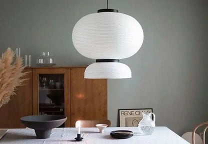 Handmade white paper chandelier with ribbed texture and black metal rim decorbites handmade white pendant light for dining room