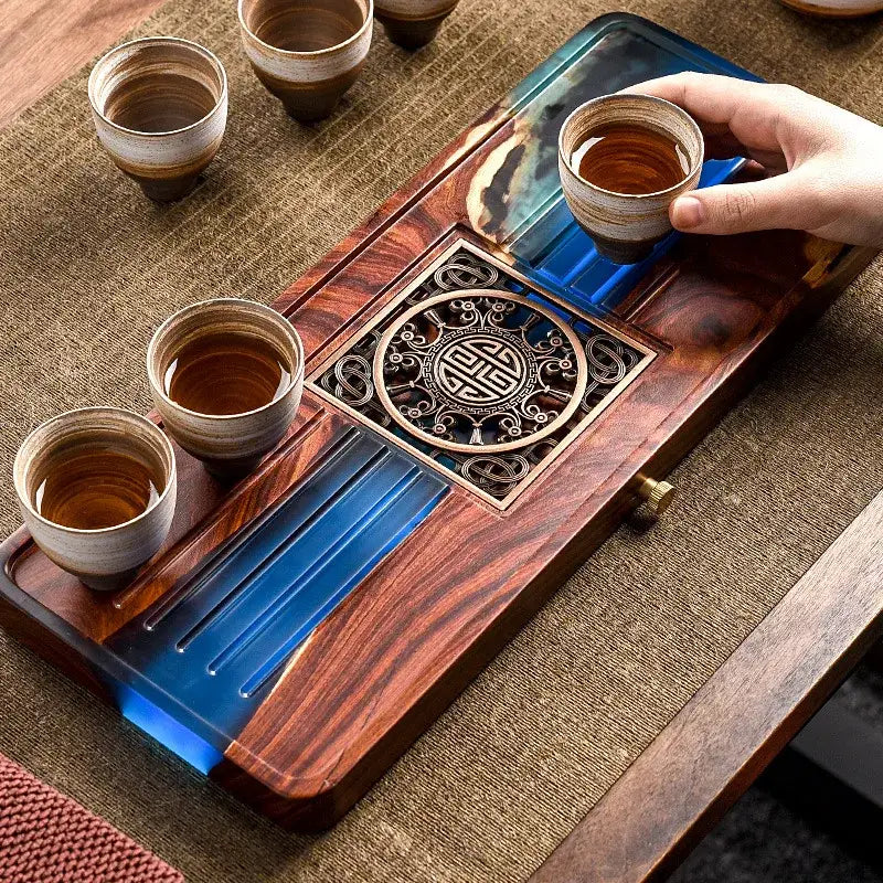 Handmade wooden tea tray with brass inlay and blue resin accents for elegant bubble tea table dining room use