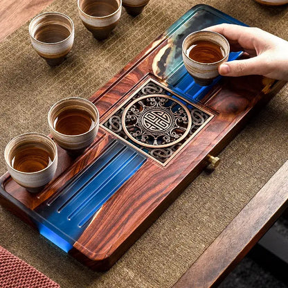 Handmade wooden tea tray with brass inlay and blue resin accents for elegant bubble tea table dining room use