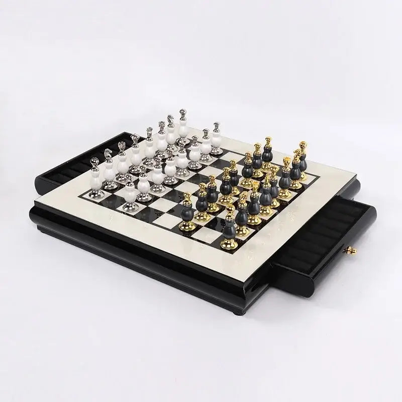 Elegant handmade wooden chess set with black and white marble board and gold-accented pieces in black case