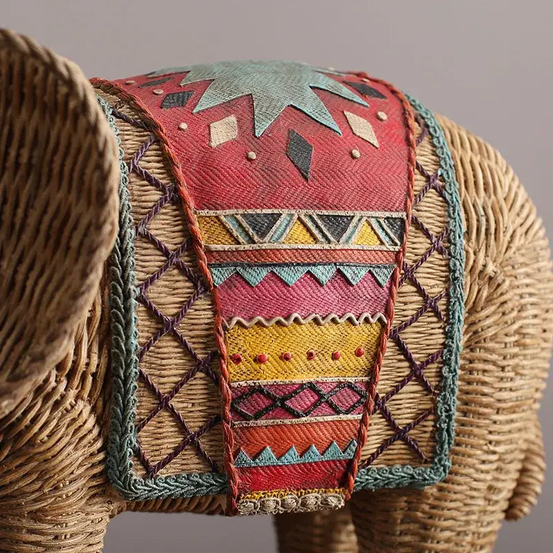 Handpainted woven rattan elephant resin handicraft ornament with vibrant red yellow teal saddle for living room decorbites elephant resin