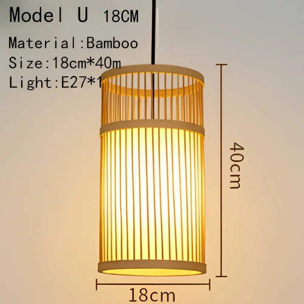 A warm cylindrical handwoven rattan pendant light with vertical slats and natural tan finish for dining room
