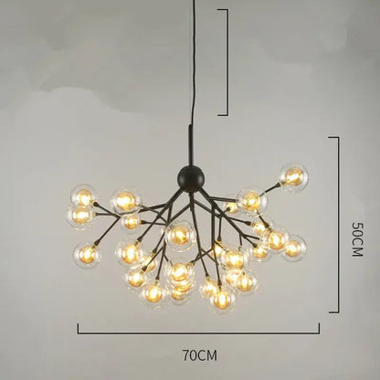 Black metal decorbites heracleum firefly chandelier with multiple clear glass globe bulbs emitting warm light for dining room decor