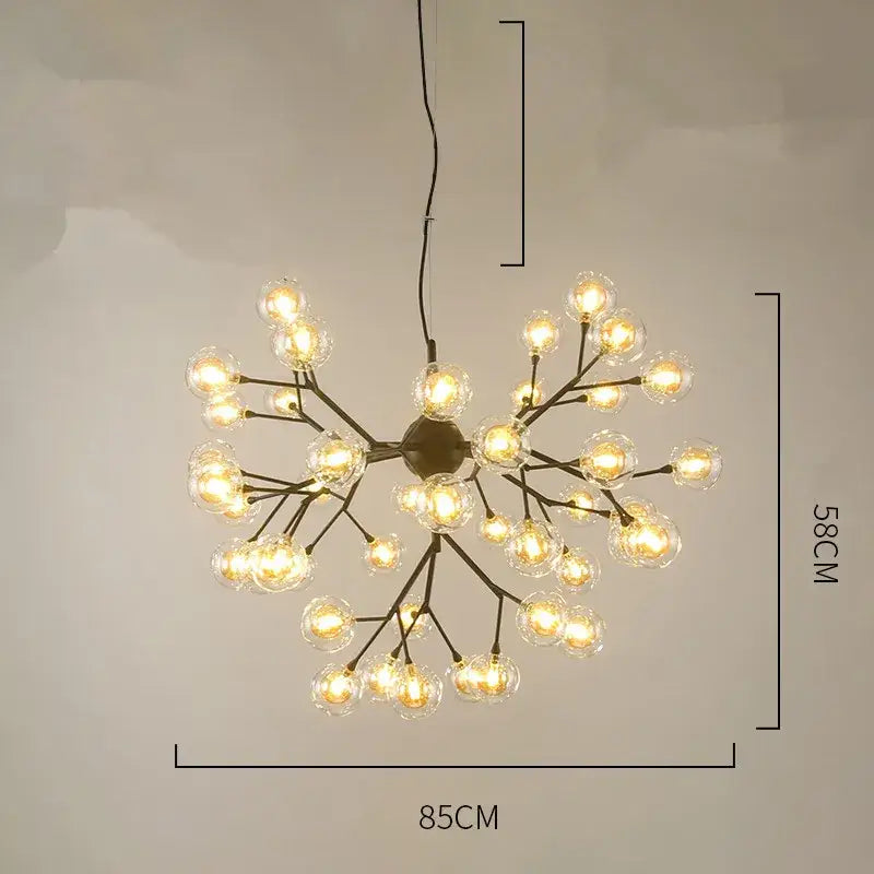 A modern black metal decorbites heracleum firefly chandelier with clear glass globe bulbs for dining room lighting