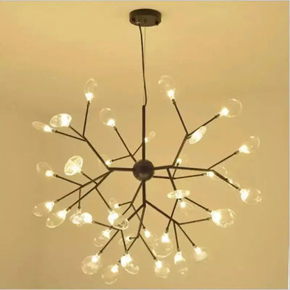 Modern black metal chandelier with clear glass bulb accents for dining room decorbites heracleum firefly gold glass ball chandelier