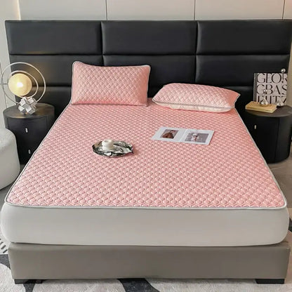 Pink quilted bed sheet set with hexagonal pattern and white piping designed for cooling bedroom comfort