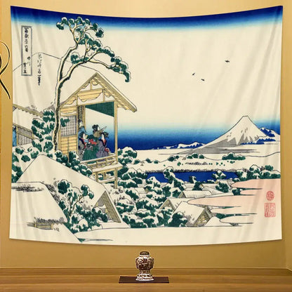 A hanging tapestry featuring traditional japanese winter landscape with mount fuji and figures, perfect for beach scenery tapestry decor