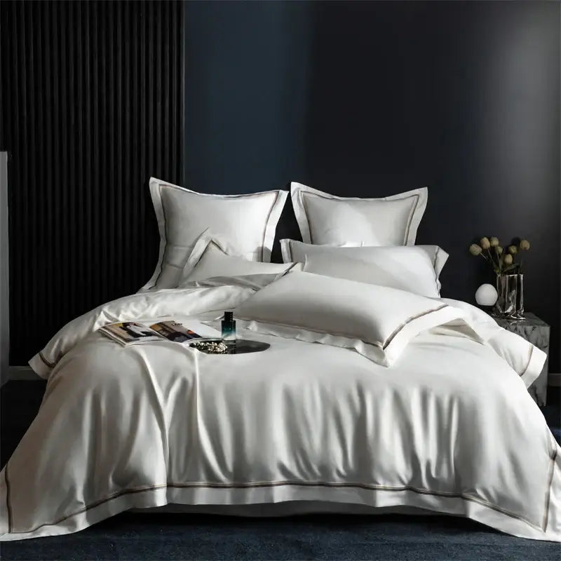 Hotel style white satin bedding set with subtle gold piping made of decorbites 1000tc egyptian cotton for bedroom decor