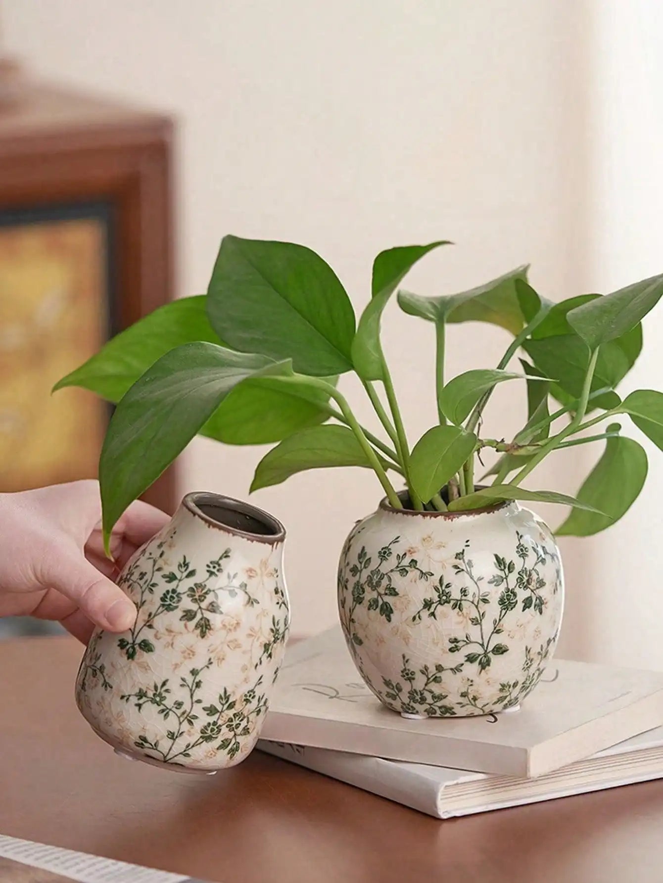 Cream-colored crackle vase with delicate black floral patterns handmade for fresh or dry flower display in living rooms