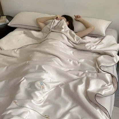 Cream-colored satin duvet cover with delicate floral and chain embroidery for decorbites ice rayon summer quilt