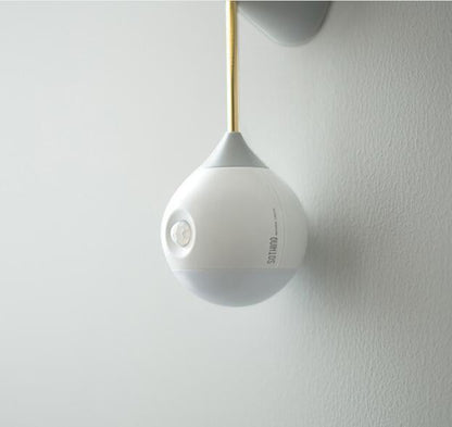 White sonos one smart speaker with gold accent and wall mount used as induction night light for bedroom and bathroom