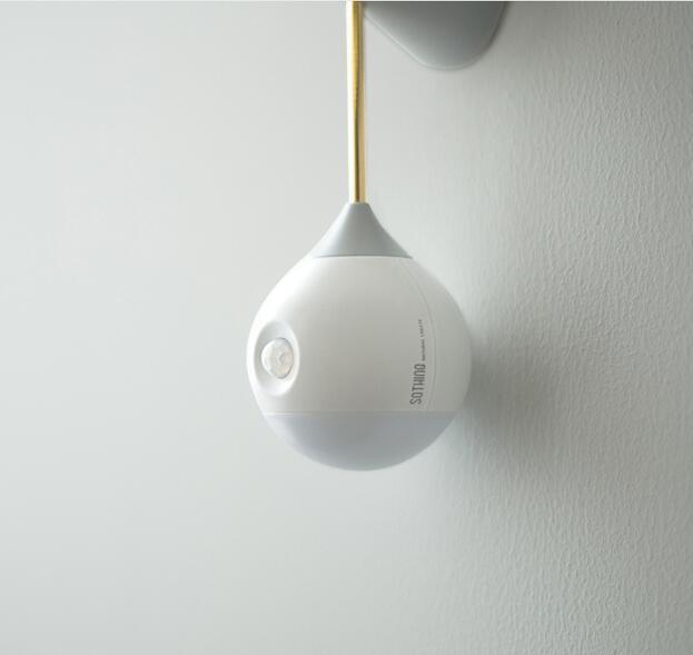 White sonos one smart speaker with gold accent and wall mount used as induction night light for bedroom and bathroom