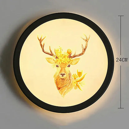 Circular industrial acrylic round wall lamp with black frame and golden deer floral wreath decorbites industrial acrylic design