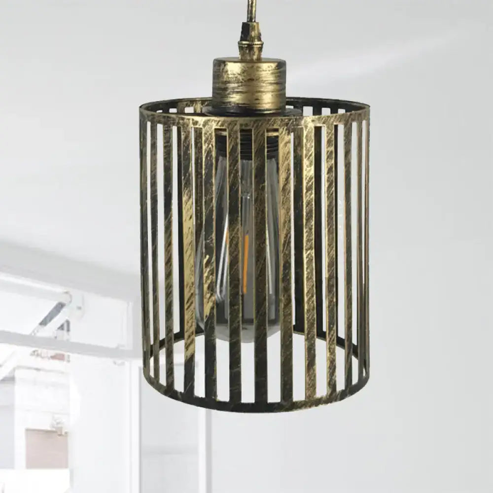 Antique brass cylindrical pendant ceiling light with vertical slats and exposed filament bulb aged brass cylinder shade