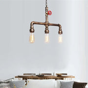 Decorbites vintage antique brass pendant light featuring three exposed filament bulbs and red valve wheel accent