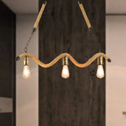 Industrial beige rope pendant light with exposed bulbs and brass fixtures for dining room lighting