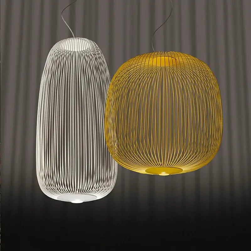 Two modern white and amber industrial birdcage iron pendant lights with slender wire frames for dining room decorbites industrial birdcage