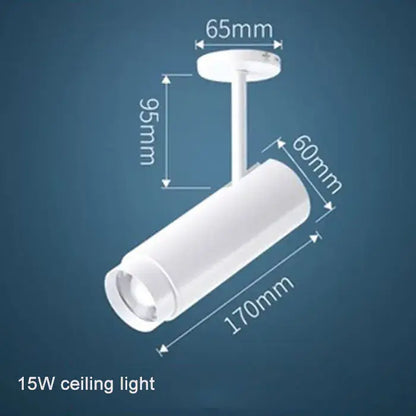 White cylindrical 15w ceiling track spotlight with adjustable focus and precise dimensional markings for modern decorbites