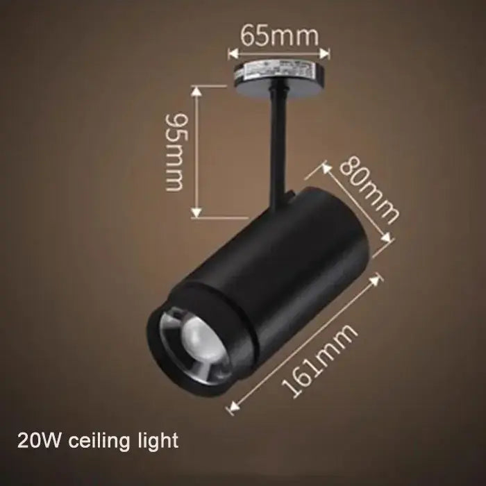 Black cylindrical 20w ceiling track spotlight with adjustable focus and matte finish by decorbites for living room lighting