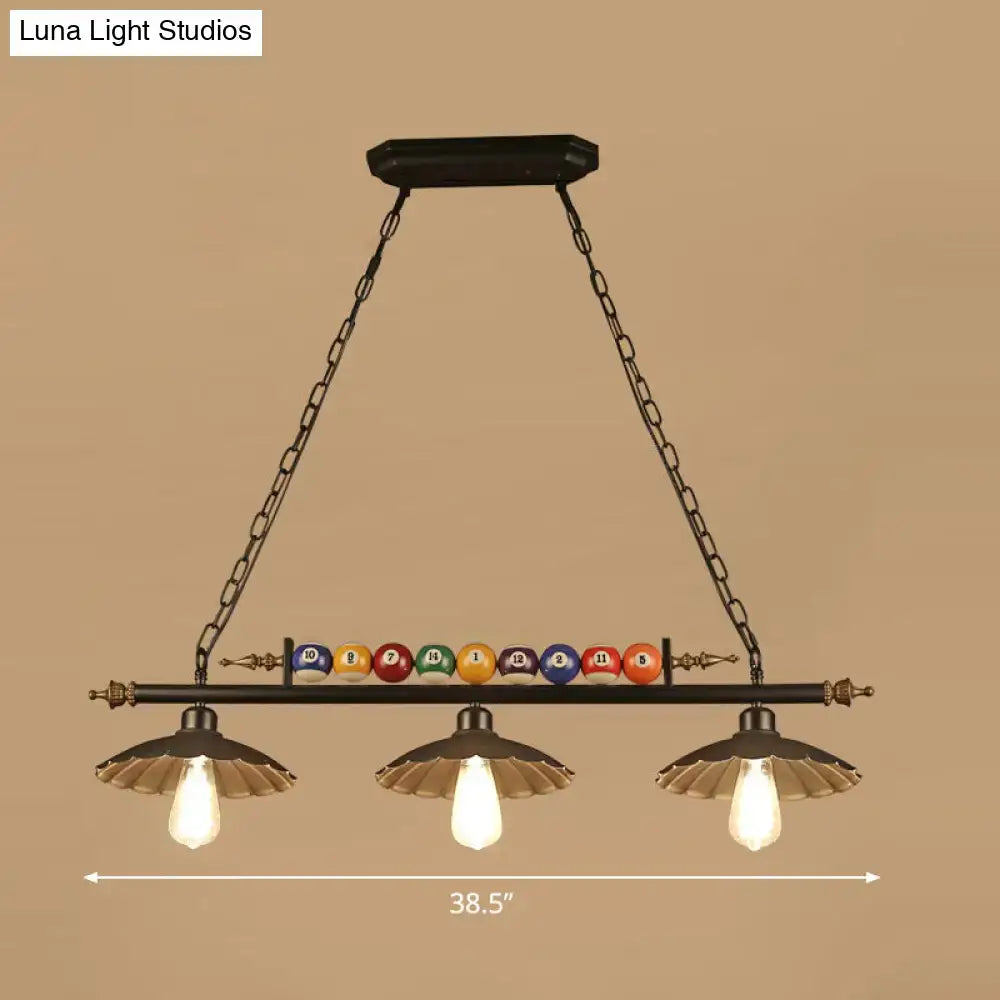 Black wrought iron industrial style pool table light with three vintage shades and colorful billiard ball deco bar