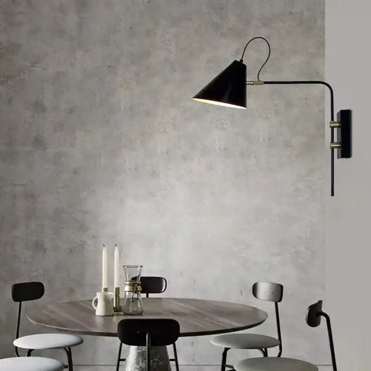 Black conical swing arm wall light with brass accents industrial vintage decorbites for living room decor