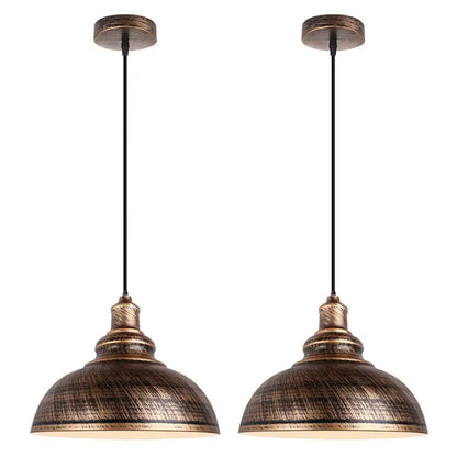 Pair of vintage-style bronze pendant lights with distressed metal shades and black cords for industrial loft iron decorbites