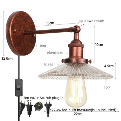 Antique brass-finished decorbites led wall sconce with textured glass shade and exposed edison bulb for bedroom lighting