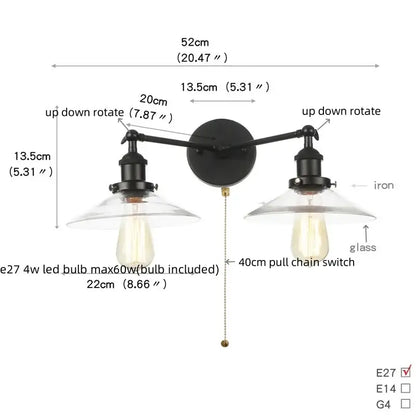 Industrial black iron wall light fixture with two adjustable arms and clear glass shades for bedroom sconce lighting