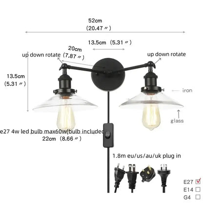 Industrial black iron wall light fixture with two adjustable arms and clear glass shades for bedroom sconce lighting