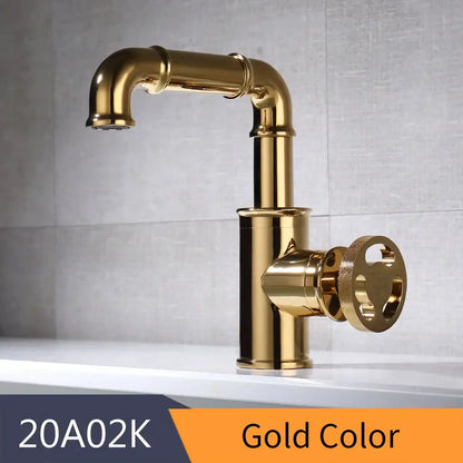 Gold-colored vintage industrial decorbites black brass basin faucet with round textured handle for bathroom use