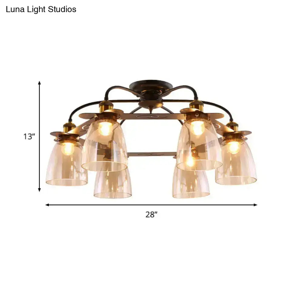 Bronze finished decorbites™ ceiling lamp with six cognac glass bell shades and circular mount for living room use