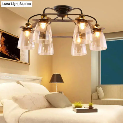 A vintage-style decorbites™ ceiling lamp with dark bronze frame and five cognac glass bell shades for living room