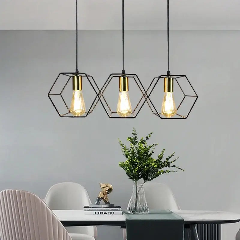 Three black and brass hexagonal metal pendant lights with edison bulbs for industrial led hanging decorbites pendant light