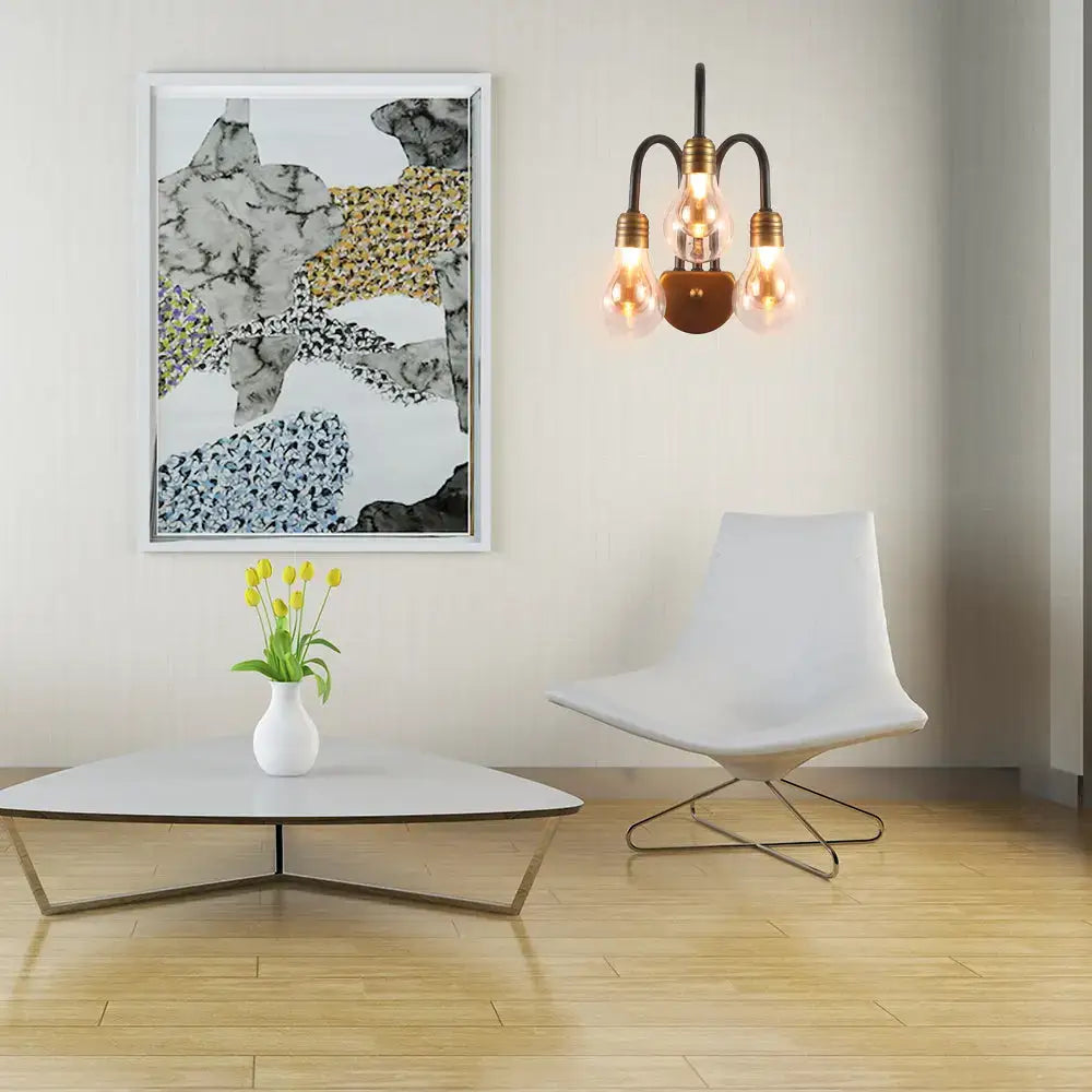 Industrial black and brass wall lamp with three exposed filament bulbs and modern fixture width for bedroom lighting