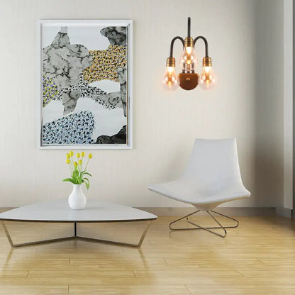 Industrial black and brass wall lamp with three exposed filament bulbs and modern fixture width for bedroom lighting