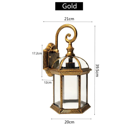 Gold-finished wrought iron wall lamp with clear glass panels and geometric patterns for decorbites black bronze wall decor