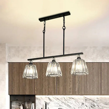 Industrial black metal pendant light with three clear faceted crystal glass shades for dining room illumination