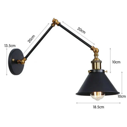 Industrial black copper vintage wall sconce with black matte finish, brass accents, and adjustable long arms for bedroom decorbites