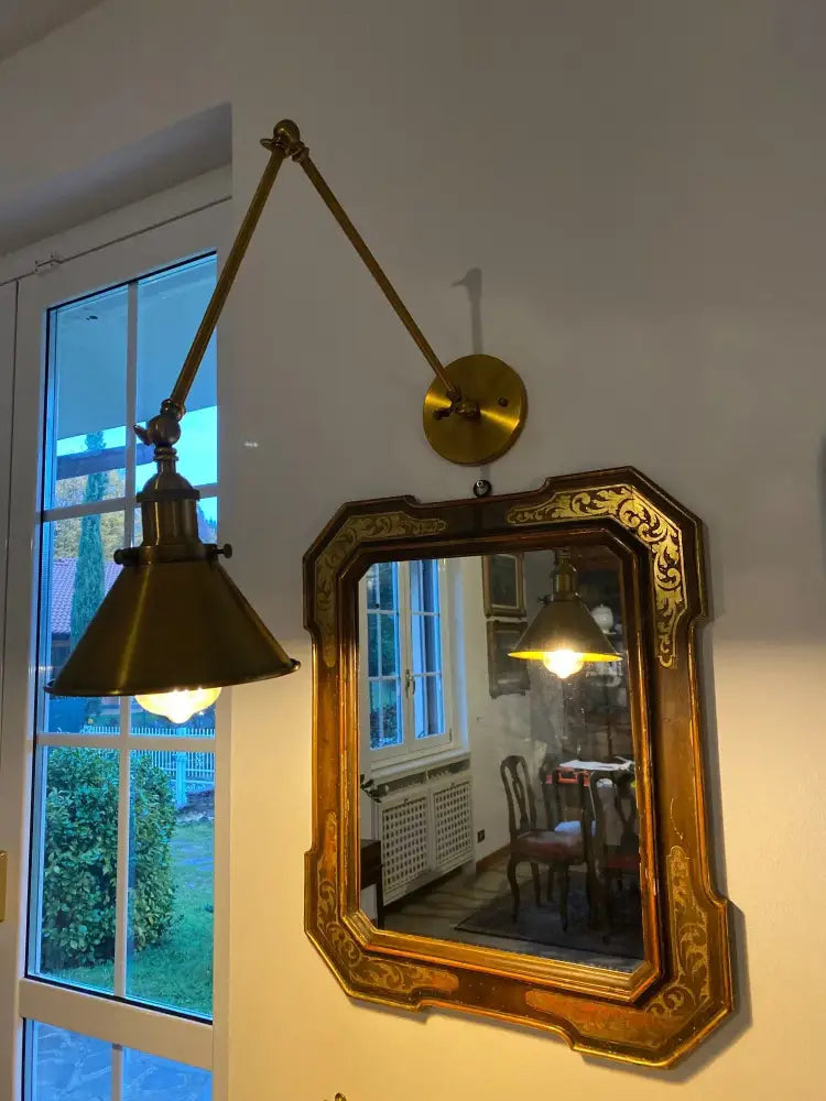 Brass adjustable wall sconce with conical shade in black copper vintage style decorbites black copper bedroom light