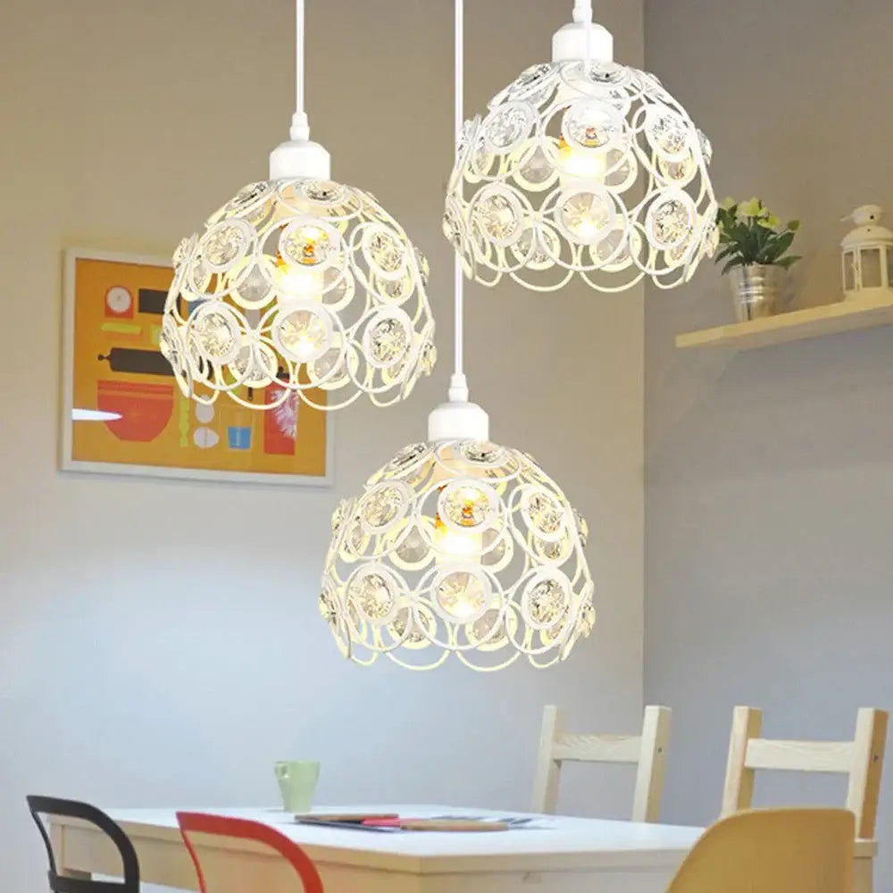 Three white pendant lamps with intricate circular metalwork and clear crystal k9 accents for kitchen island decorbites crystal pendant lamp