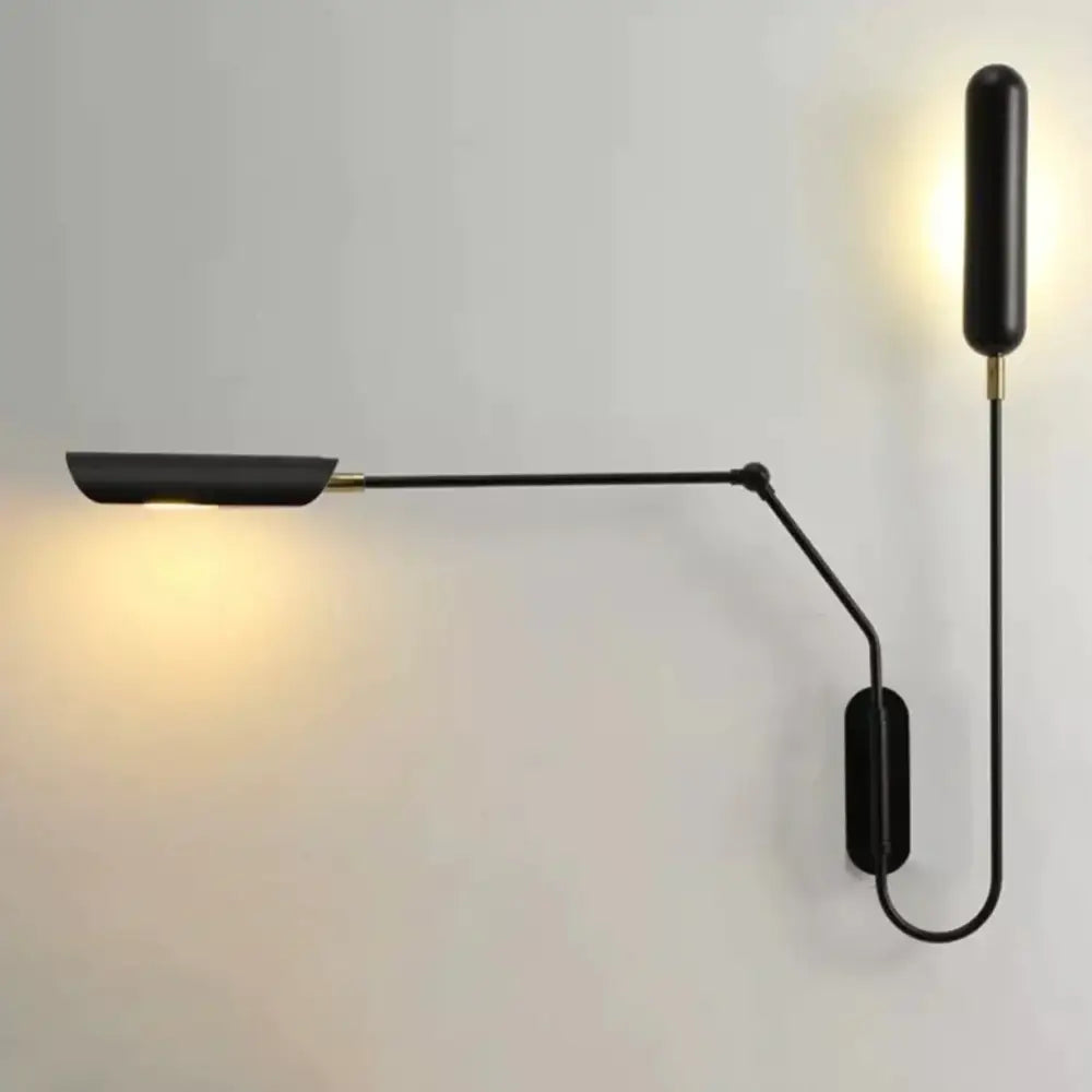 Black emma industrial wall lamp with adjustable arm, brass accents, minimalist design for bedroom reading light