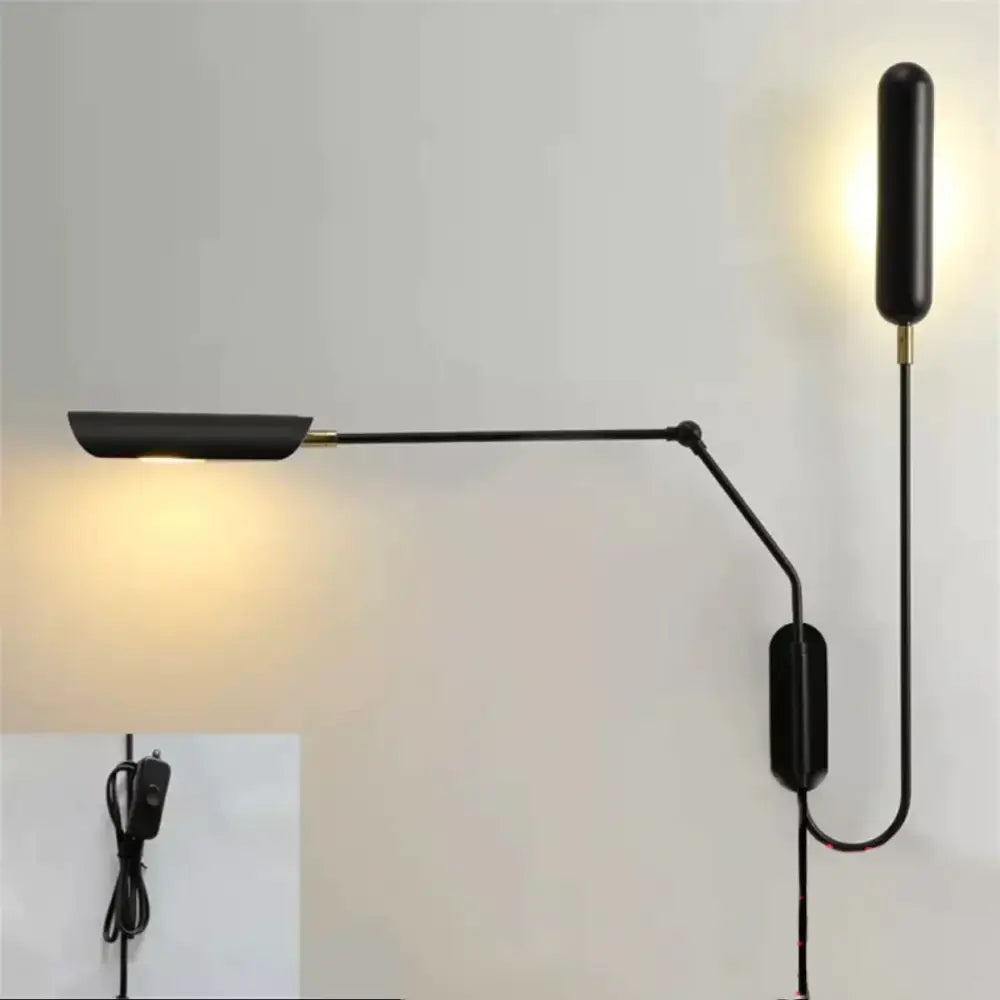 Black adjustable emma industrial wall lamp with brass accents and minimalist design for bedroom reading light