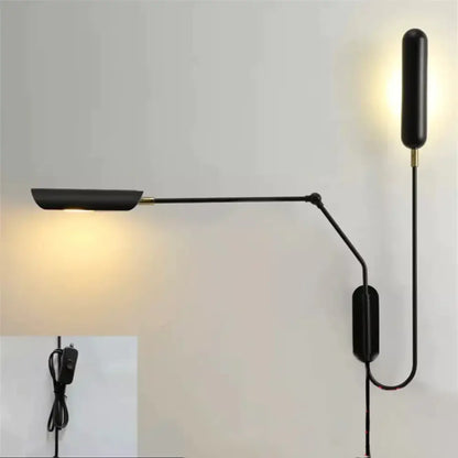 Black adjustable emma industrial wall lamp with brass accents and minimalist design for bedroom reading light