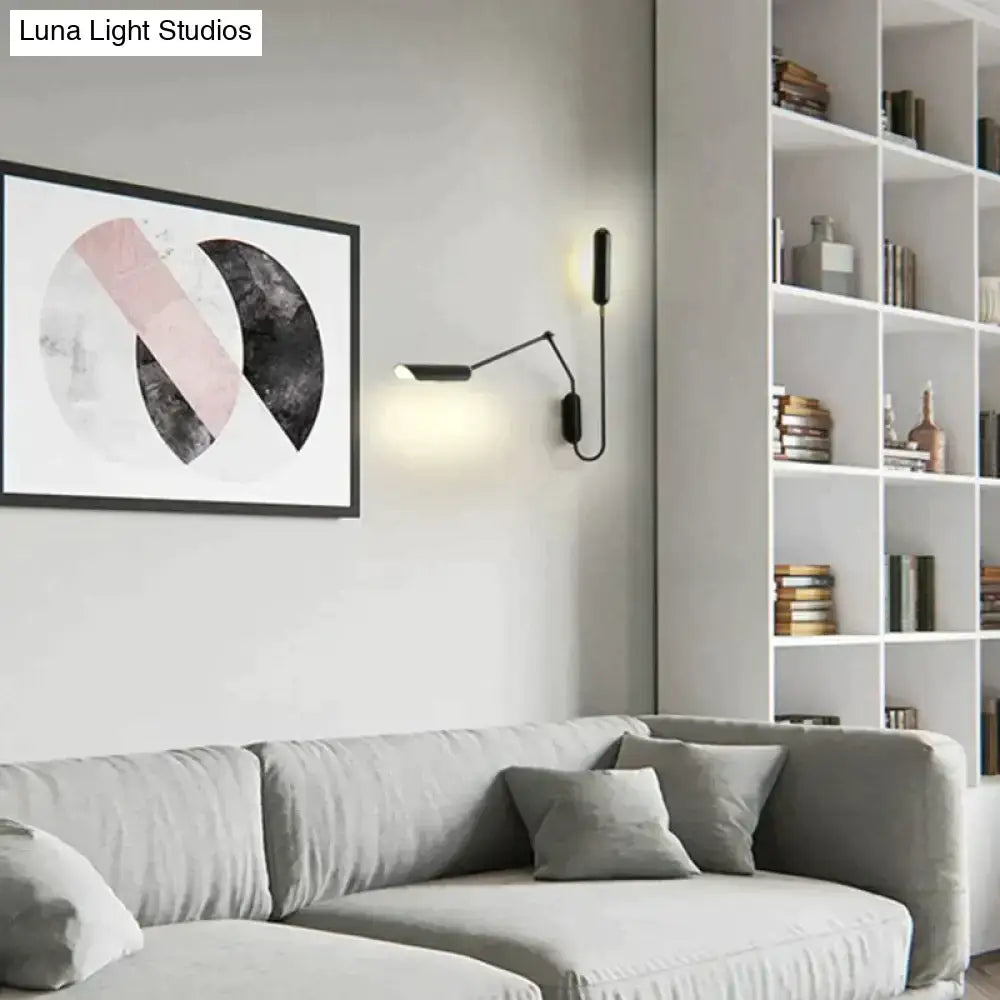 Black articulated emma industrial wall sconce with minimalist design and warm led lighting for bedroom reading light