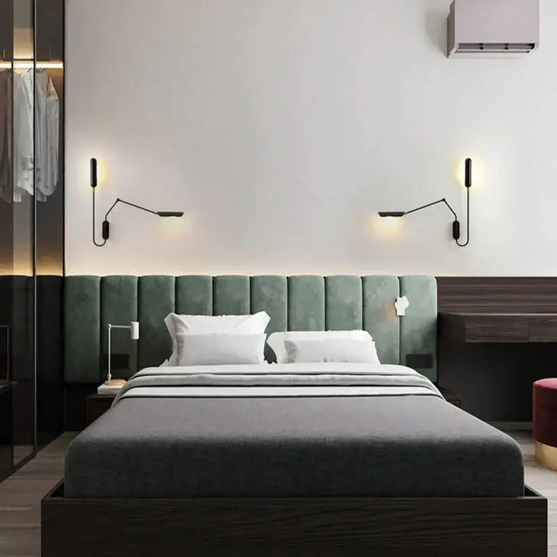 Green upholstered bed headboard with tufted panels and dark wood frame paired with emma industrial wall lamp bedroom reading light