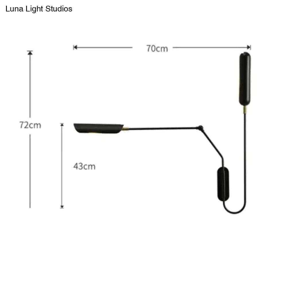 Black minimalist emma industrial wall lamp with sleek articulated arm and cylindrical fixtures for bedroom reading light