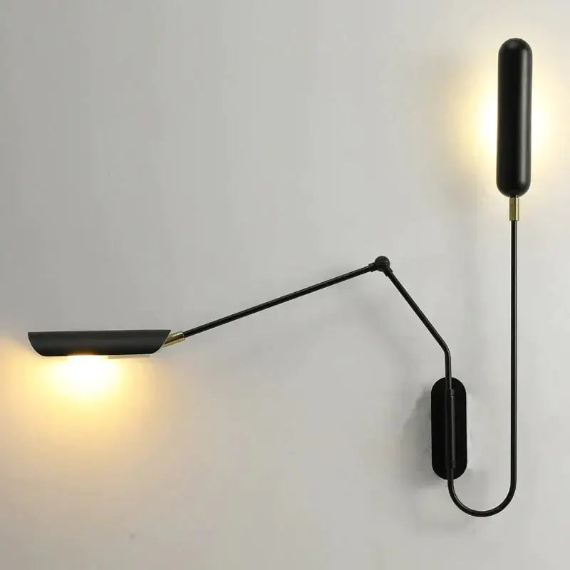 Black emma industrial wall lamp with articulated arm and warm light for bedroom reading in industrial style