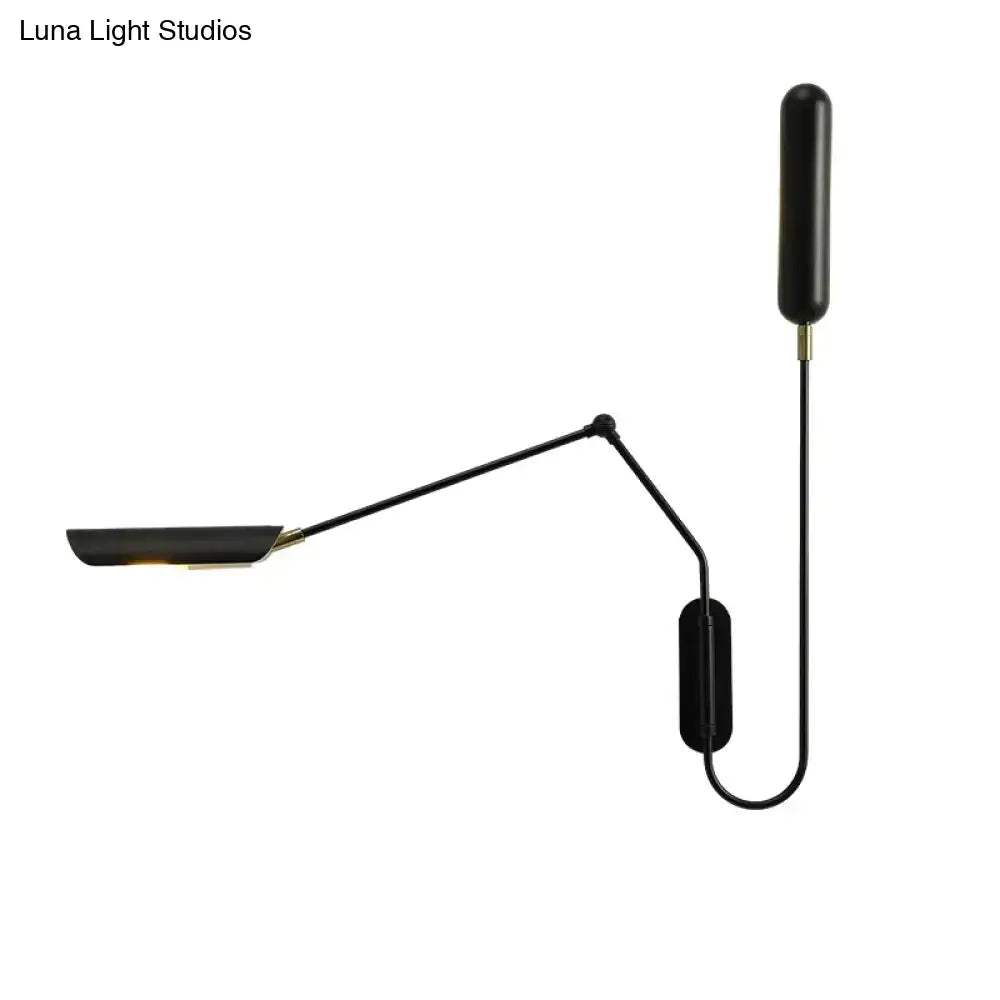 Black emma industrial wall lamp with a sleek articulated arm and matte finish for bedroom reading light