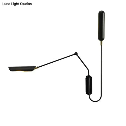 Black emma industrial wall lamp with a sleek articulated arm and matte finish for bedroom reading light