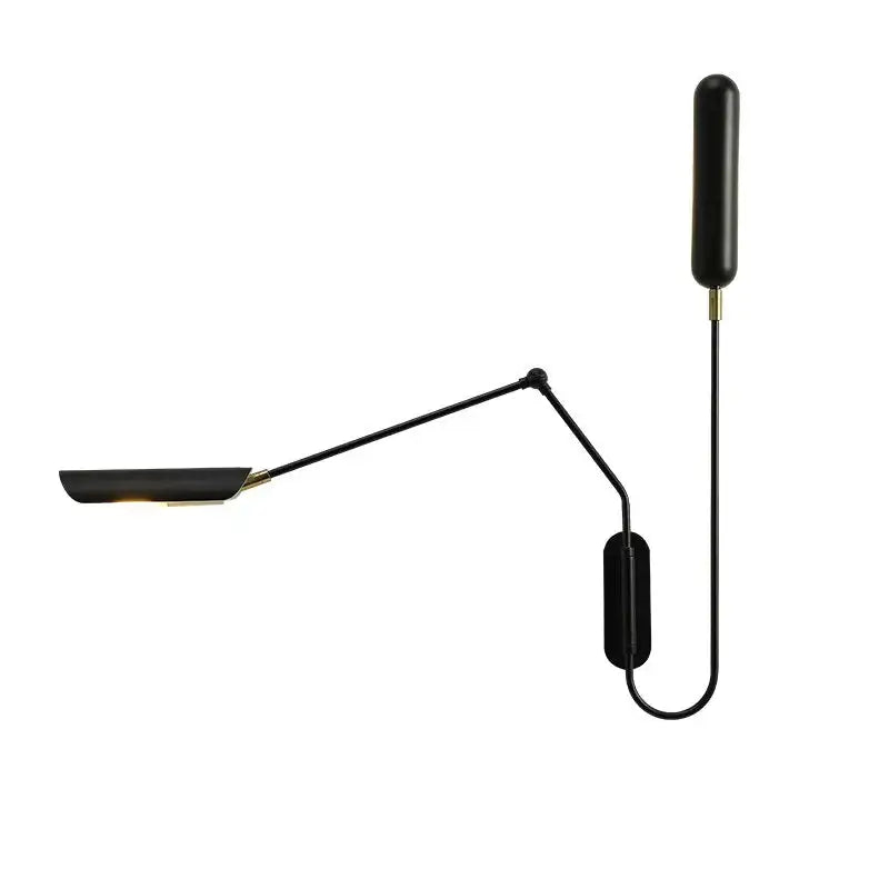 Black emma industrial wall lamp with sleek articulated arm and brass accents for bedroom reading light